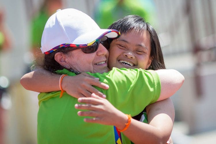 Special Olympics volunteer and athlete