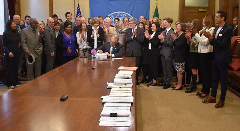 Gov. Jay Inslee signs the 2019–21 operating budget