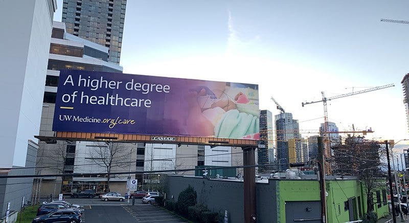A higher degree of healthcare billboard on Denny Way