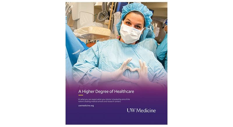 UW Medicine print ad showing doctor in scrubs making a heart with her fingers