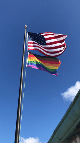 Harborview Pride flag and American flag