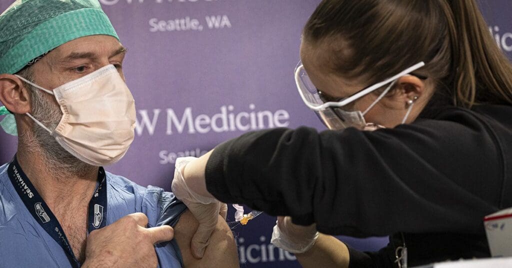 Joseph Gipson receives the COVID-19 vaccine