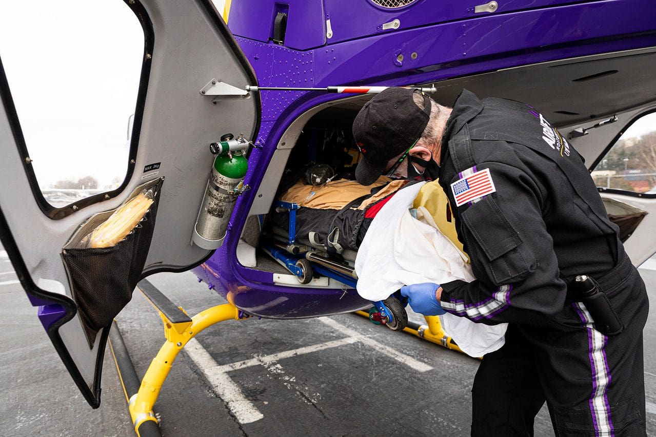 loading patient into helicopter