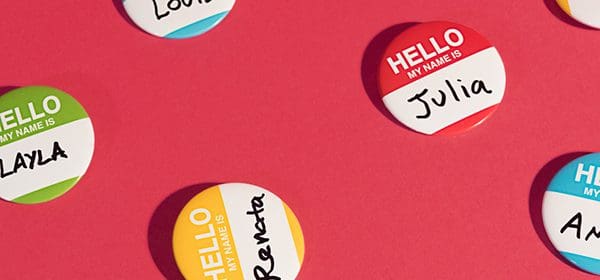 Several 'hello' buttons with names on a pink background