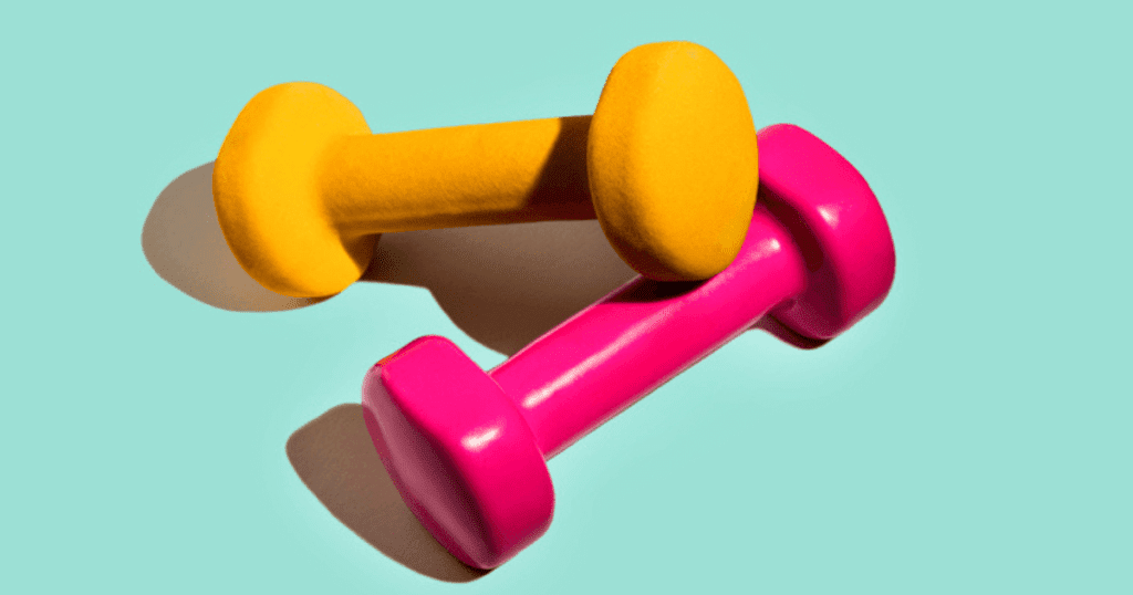 yellow and pink dumbells on blue background