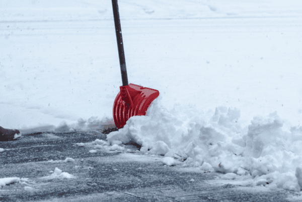 person shoveling snow